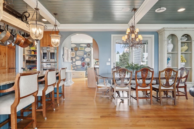 dining room with arched walkways, wood ceiling, light wood-type flooring, and a chandelier