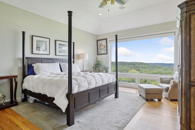 bedroom featuring a ceiling fan and wood finished floors