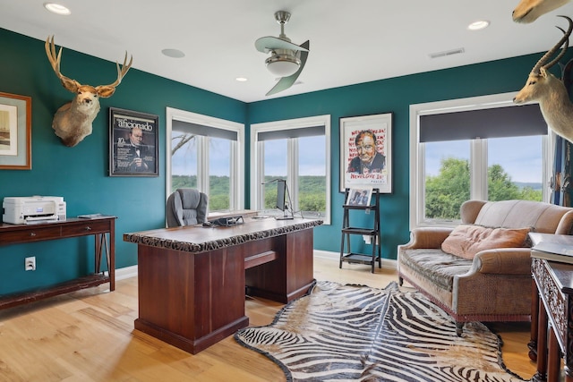 office area with ceiling fan, visible vents, light wood-type flooring, baseboards, and recessed lighting