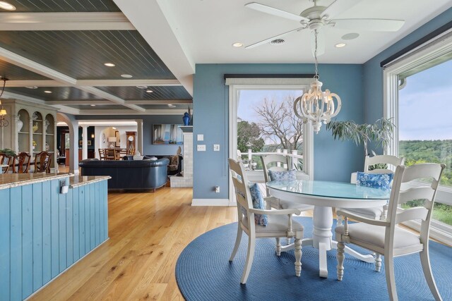 dining room featuring visible vents, beamed ceiling, ceiling fan with notable chandelier, recessed lighting, and light wood-style flooring