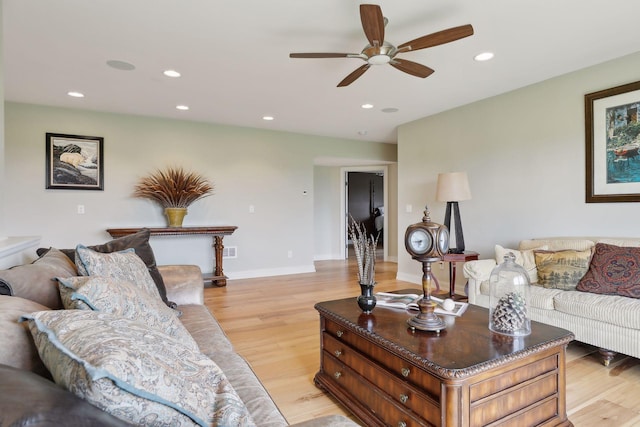 living room with recessed lighting, ceiling fan, visible vents, and light wood-style floors