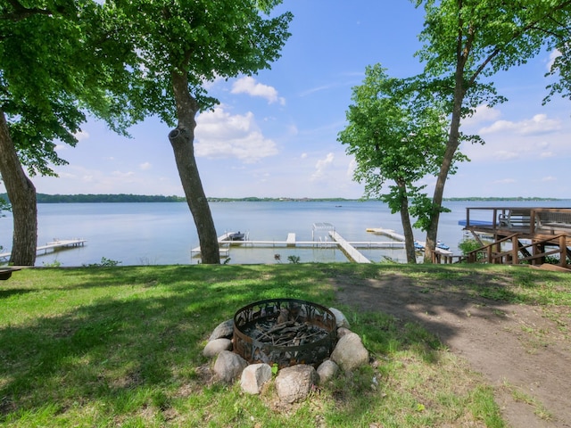 1321 Darling Dr NW, Alexandria, MN 56308 - exterior space with a fire pit, a dock, and a water view