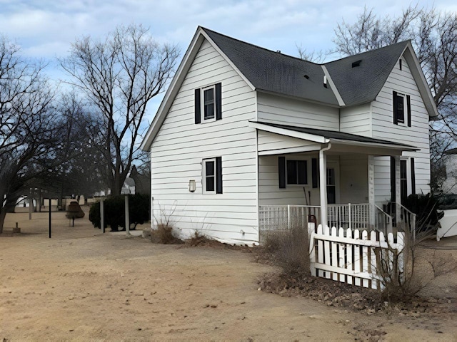 208 Dugan St S, Welcome, MN 56181 - view of front of home with a porch and roof with shingles
