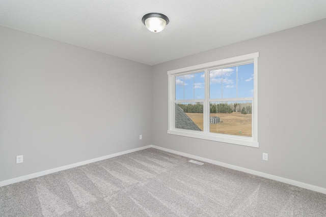 21057 Tippecanoe St NE, East Bethel, MN 55011 - carpeted empty room featuring baseboards