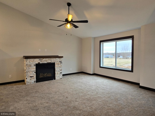602 Warren St, Janesville, MN 56048 - unfurnished living room with carpet flooring, baseboards, vaulted ceiling, and ceiling fan