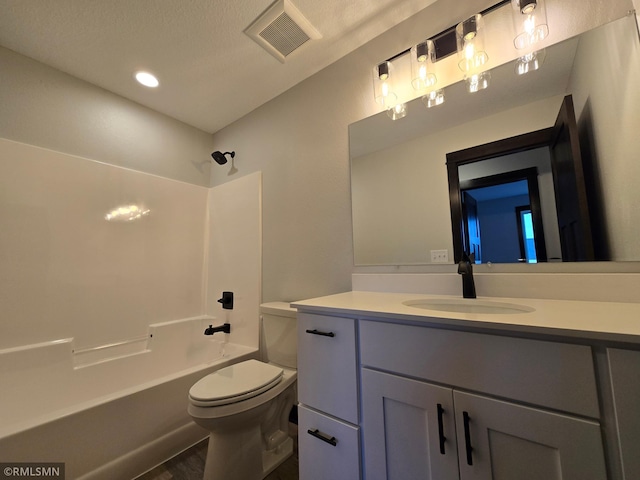 602 Warren St, Janesville, MN 56048 - full bath featuring toilet, vanity,  shower combination, and visible vents