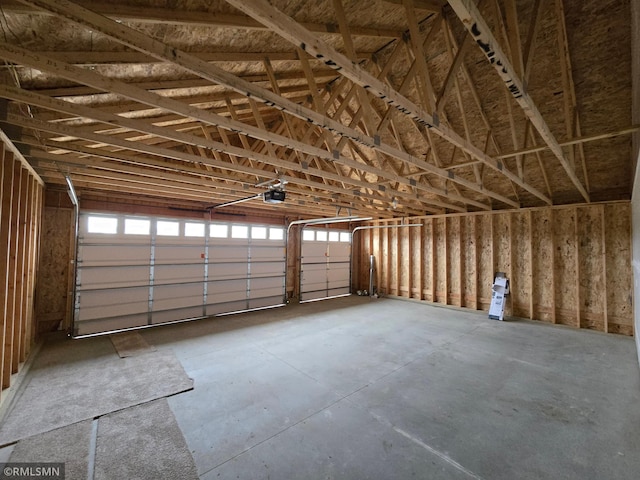 602 Warren St, Janesville, MN 56048 - garage featuring a garage door opener