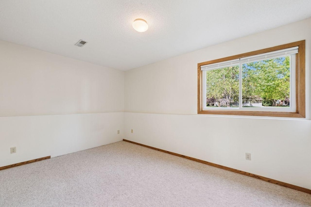 3865 Westbury Ln, Eagan, MN 55123 - spare room featuring carpet flooring and baseboards