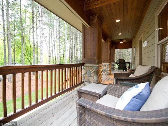 wooden terrace with ceiling fan