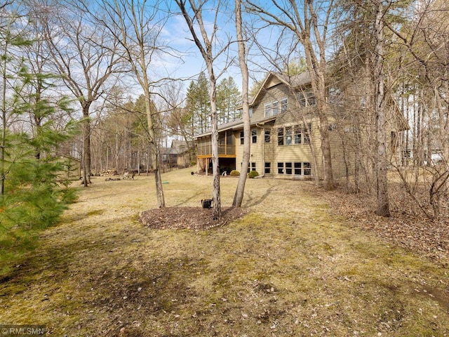 view of yard with a wooden deck
