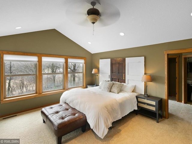 bedroom featuring recessed lighting, vaulted ceiling, light carpet, visible vents, and a ceiling fan