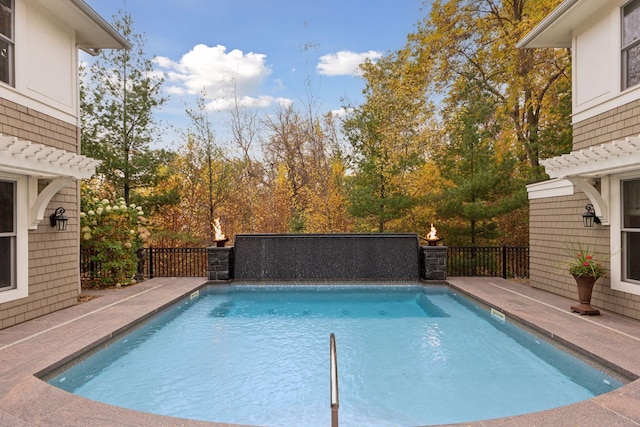 view of swimming pool featuring a fenced in pool