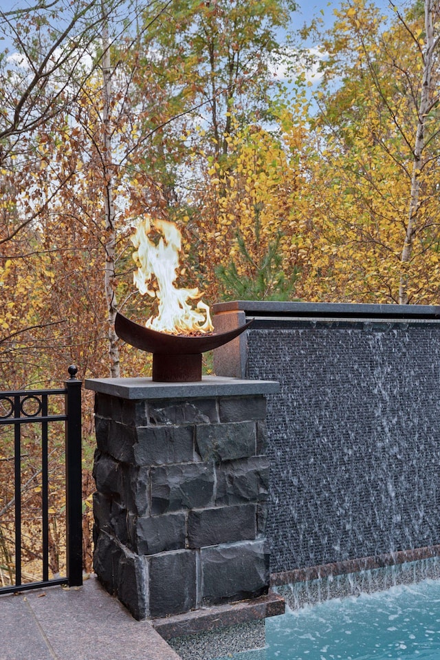 details featuring an outdoor fire pit