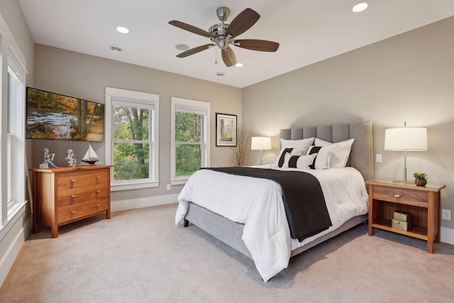 carpeted bedroom with recessed lighting, baseboards, and ceiling fan