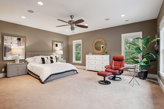bedroom with recessed lighting and carpet