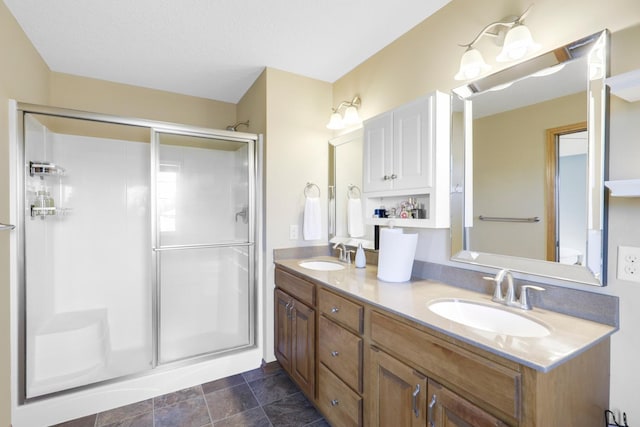 2923 124th Cir NE, Blaine, MN 55449 - bathroom featuring a stall shower and double vanity