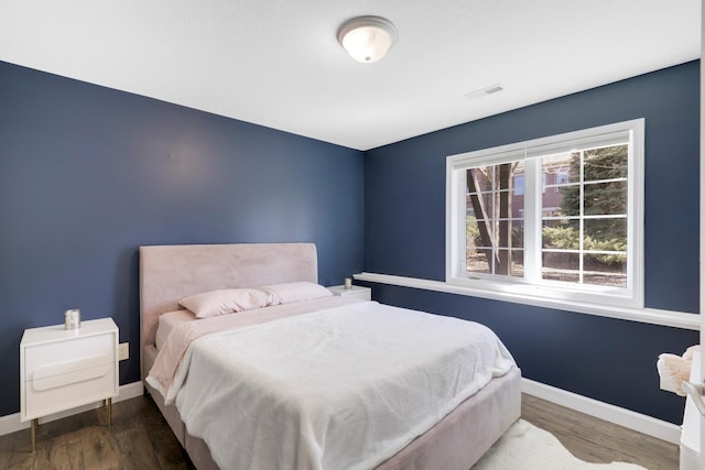 2923 124th Cir NE, Blaine, MN 55449 - bedroom featuring baseboards and wood finished floors