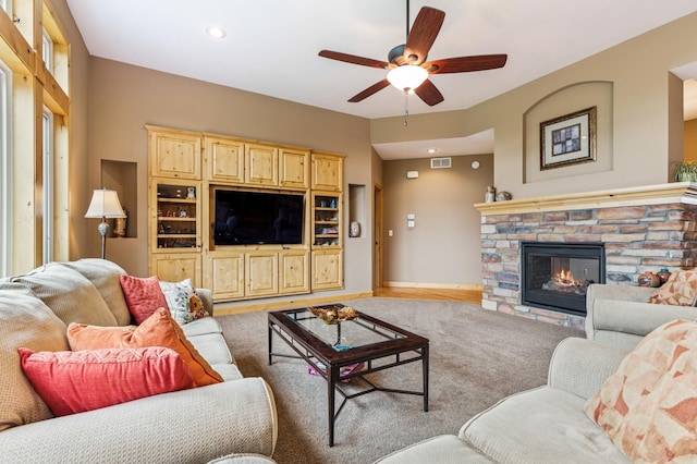 17623 Grist Ct SW, Prior Lake, MN 55372 - living room featuring ceiling fan, a fireplace, and baseboards