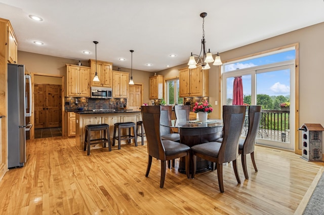 17623 Grist Ct SW, Prior Lake, MN 55372 - dining space with light wood-style flooring and recessed lighting