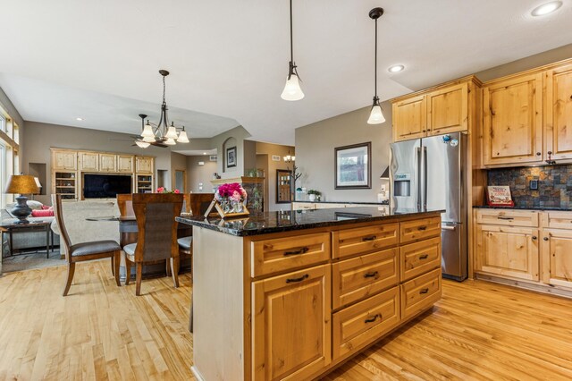 17623 Grist Ct SW, Prior Lake, MN 55372 - kitchen featuring stainless steel refrigerator with ice dispenser, light wood-type flooring, decorative backsplash, decorative light fixtures, and recessed lighting