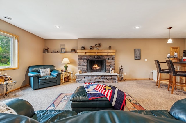 17623 Grist Ct SW, Prior Lake, MN 55372 - living room with carpet floors, a warm lit fireplace, baseboards, and recessed lighting