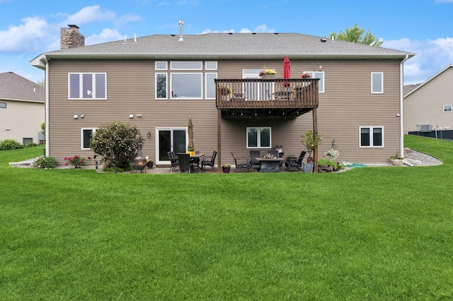 17623 Grist Ct SW, Prior Lake, MN 55372 - rear view of house with a chimney, a yard, a patio, and a shingled roof