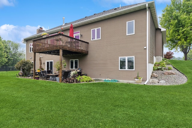 17623 Grist Ct SW, Prior Lake, MN 55372 - back of property featuring a lawn, a patio, a chimney, and a balcony