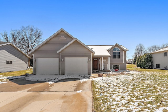 1015 Havana Rd, Owatonna, MN 55060 - tri-level home featuring driveway and an attached garage