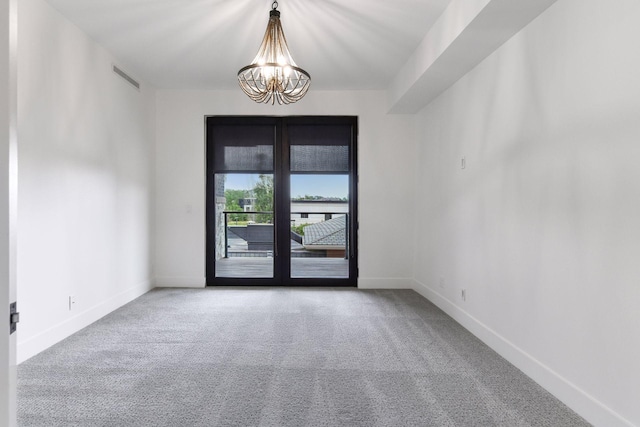 222 Ferndale Rd S Unit 207, Wayzata, MN 55391 - carpeted empty room with a chandelier and baseboards