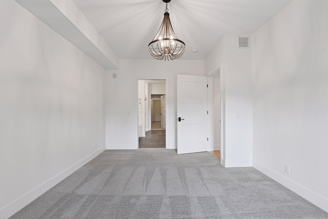 222 Ferndale Rd S Unit 207, Wayzata, MN 55391 - carpeted empty room with a chandelier and baseboards