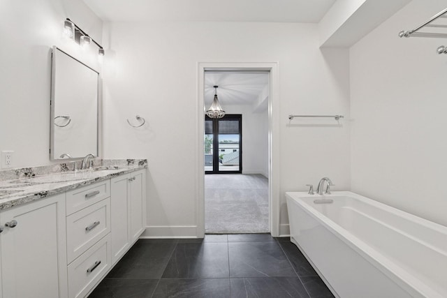 222 Ferndale Rd S Unit 207, Wayzata, MN 55391 - full bathroom featuring a soaking tub, double vanity, and tile patterned flooring