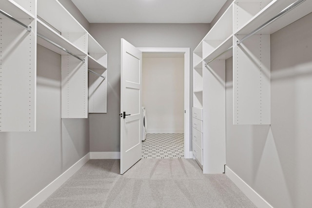 222 Ferndale Rd S Unit 207, Wayzata, MN 55391 - spacious closet featuring light colored carpet and washer / clothes dryer