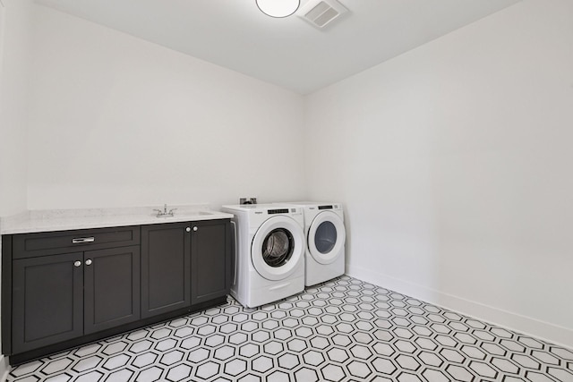 222 Ferndale Rd S Unit 207, Wayzata, MN 55391 - laundry area with cabinet space and separate washer and dryer