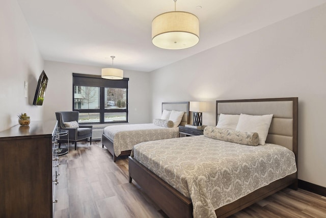 222 Ferndale Rd S Unit 207, Wayzata, MN 55391 - bedroom with wood finished floors