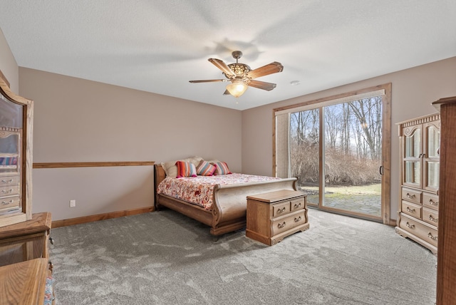 carpeted bedroom with baseboards, access to outside, and a ceiling fan