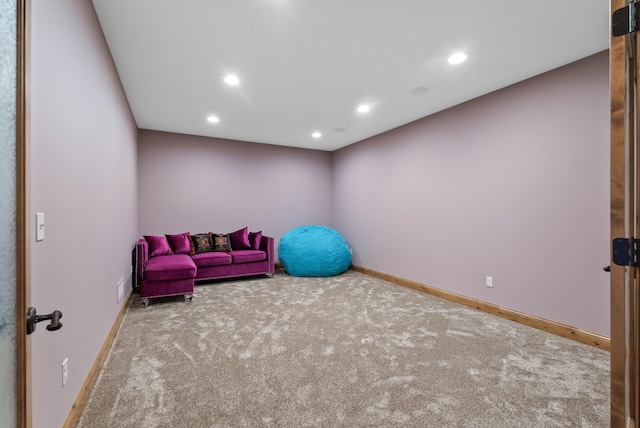 exercise room featuring baseboards, recessed lighting, and carpet