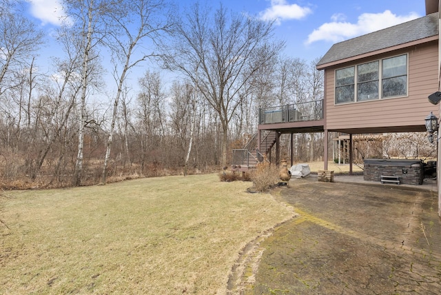view of yard featuring stairway and a deck
