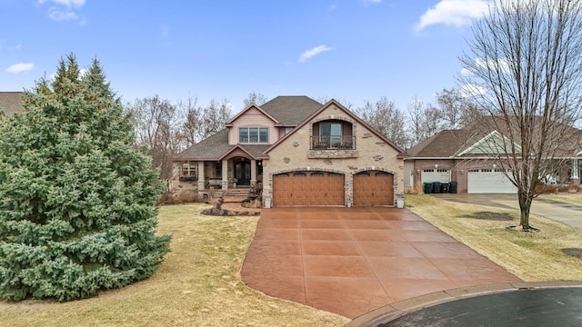 view of front facade featuring concrete driveway, roof with shingles, a front yard, brick siding, and a garage