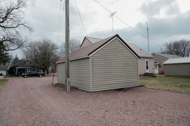 view of home's exterior with metal roof