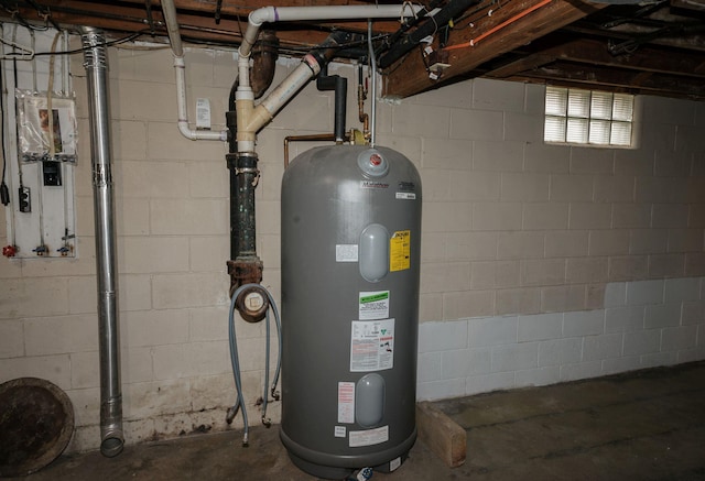 utility room with electric water heater