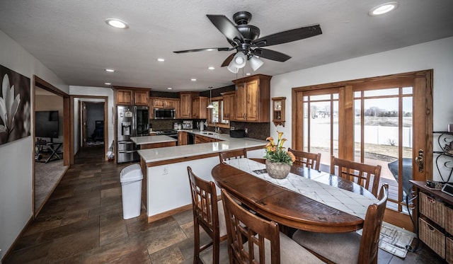 dining space featuring a wealth of natural light, recessed lighting, and ceiling fan
