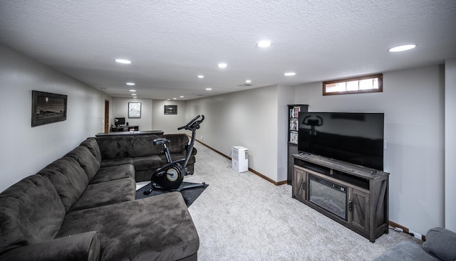living room with baseboards, light carpet, a textured ceiling, and recessed lighting