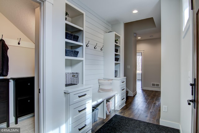 mudroom featuring visible vents, baseboards, recessed lighting, and dark wood-style floors