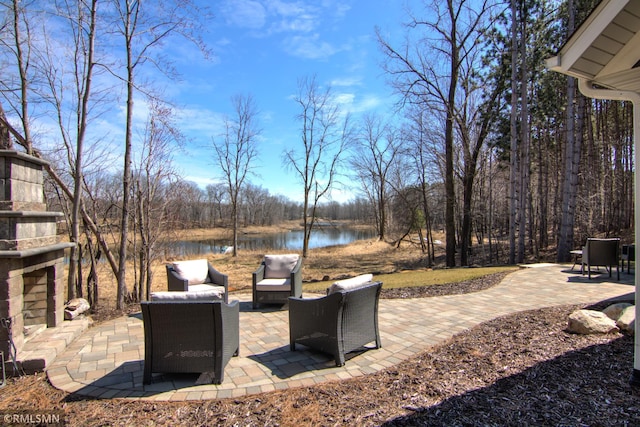 view of patio / terrace featuring a water view