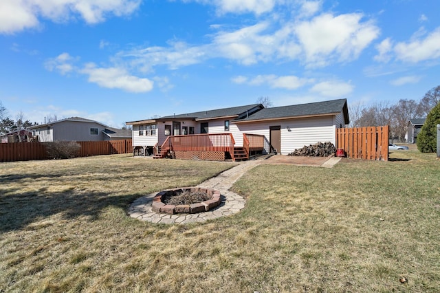 11345 Brenda Blvd, Becker, MN 55308 - back of house featuring a deck and an outdoor fire pit