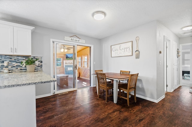 11345 Brenda Blvd, Becker, MN 55308 - dining area with dark wood finished floors, baseboards, a ceiling fan, and a textured ceiling