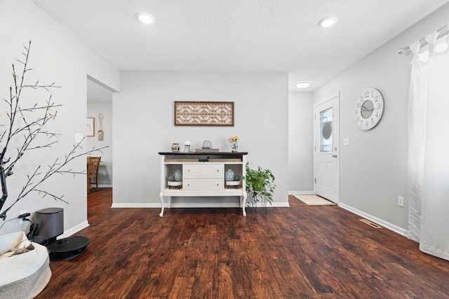 11345 Brenda Blvd, Becker, MN 55308 - entrance foyer featuring wood finished floors, baseboards, recessed lighting, and a textured ceiling