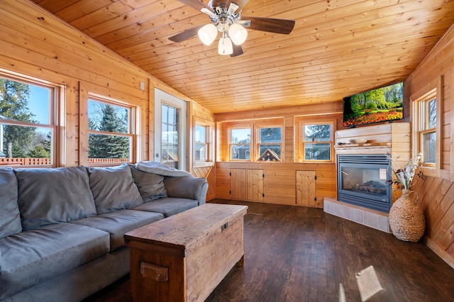 11345 Brenda Blvd, Becker, MN 55308 - living area with wooden walls, wood ceiling, a glass covered fireplace, dark wood finished floors, and a ceiling fan