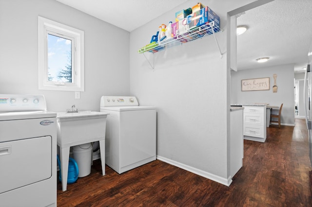 11345 Brenda Blvd, Becker, MN 55308 - washroom with washing machine and clothes dryer, dark wood-style floors, and baseboards