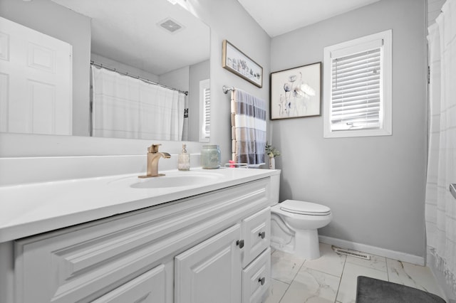 11345 Brenda Blvd, Becker, MN 55308 - full bath with vanity, marble look tile flooring, toilet, and baseboards